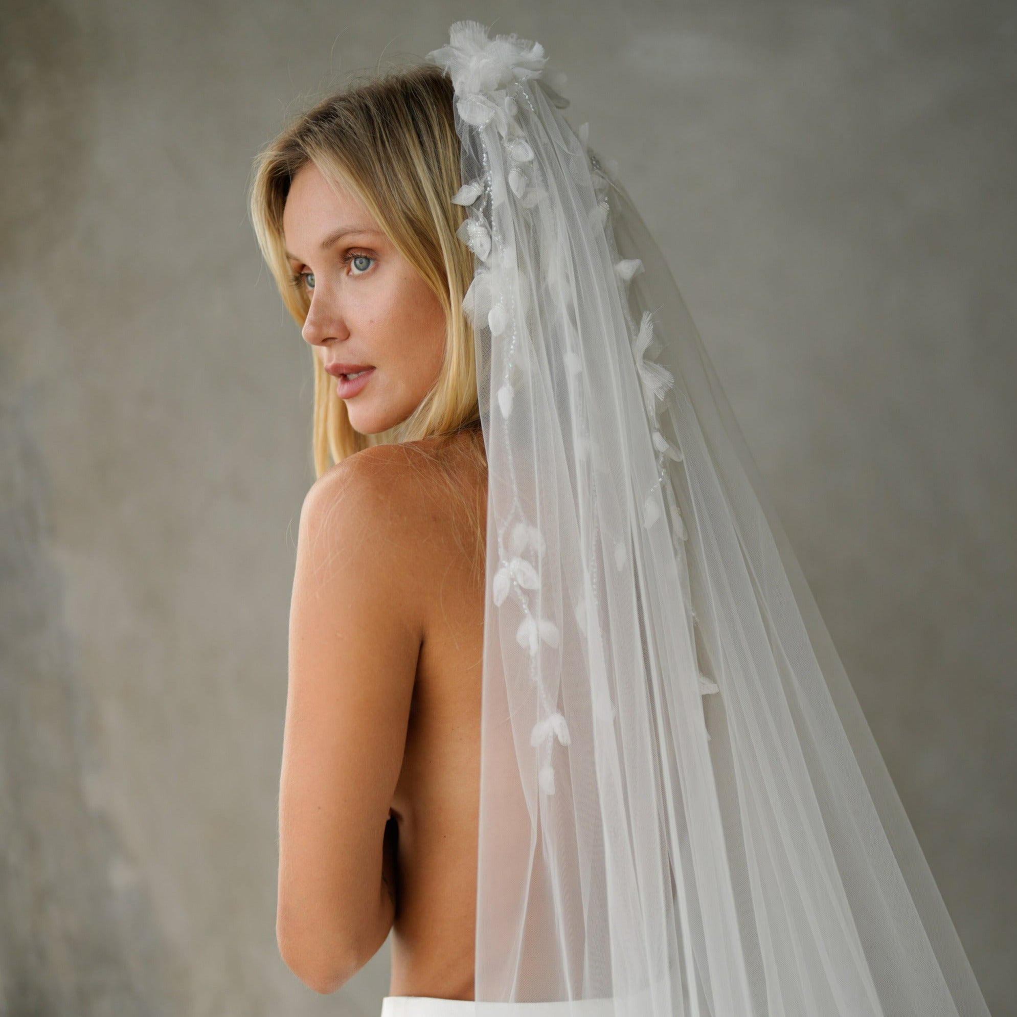 Silk flower and pearl veil