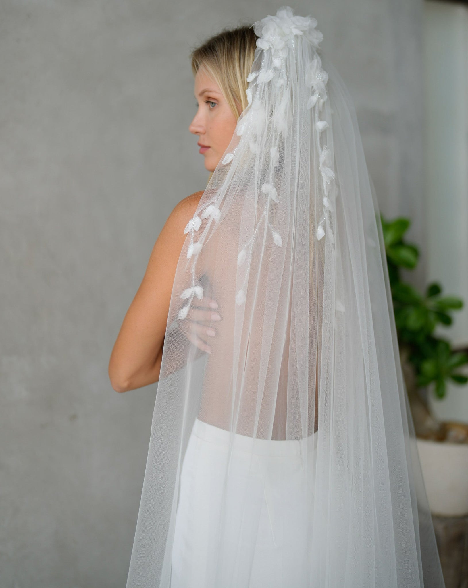 Silk flower and pearl veil