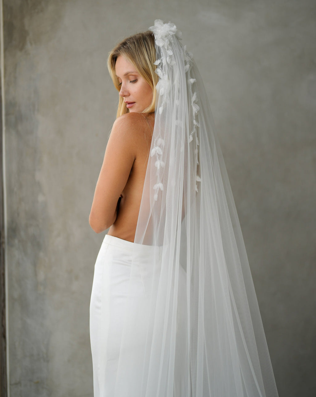 Silk flower and pearl veil