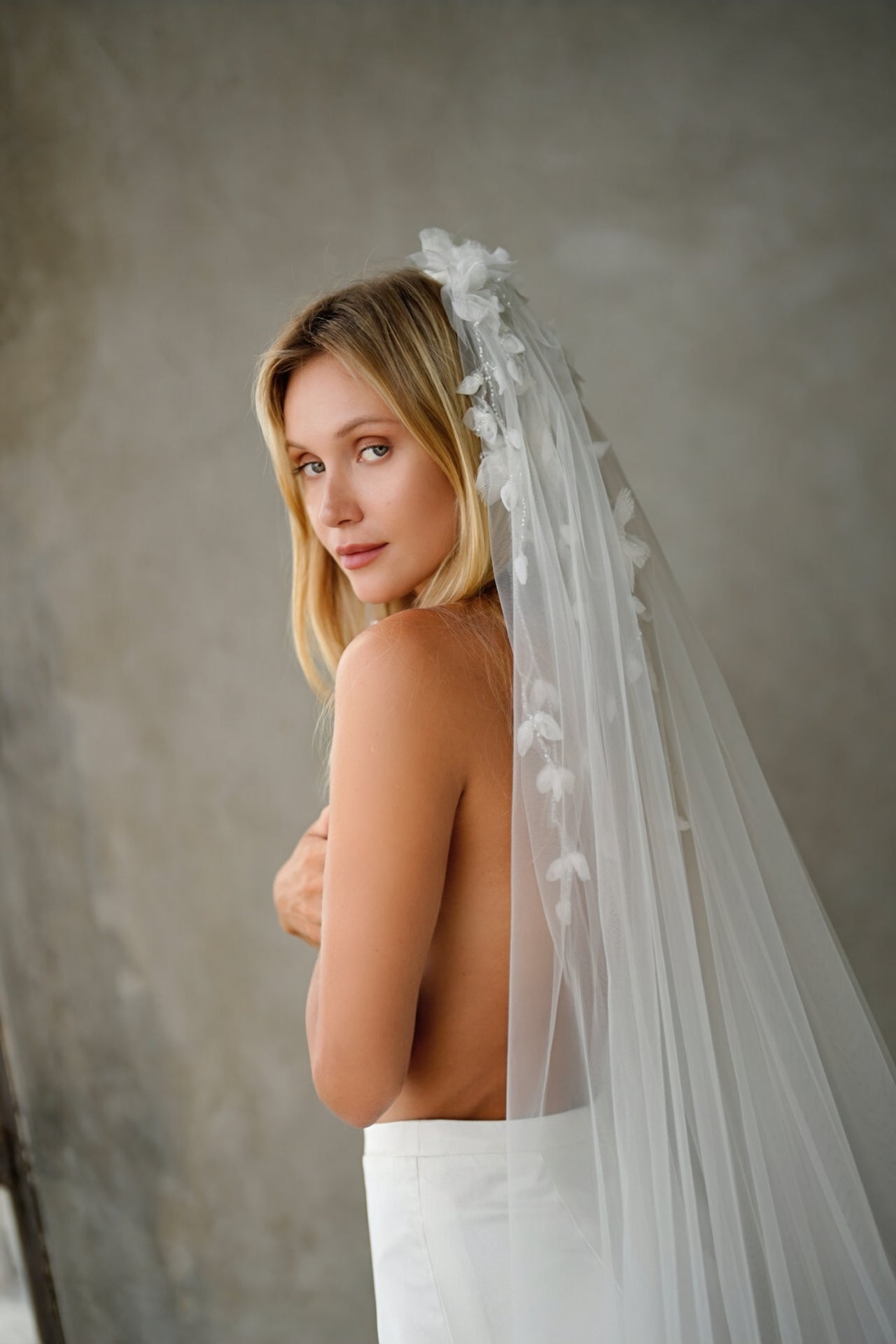 Silk flower and pearl veil